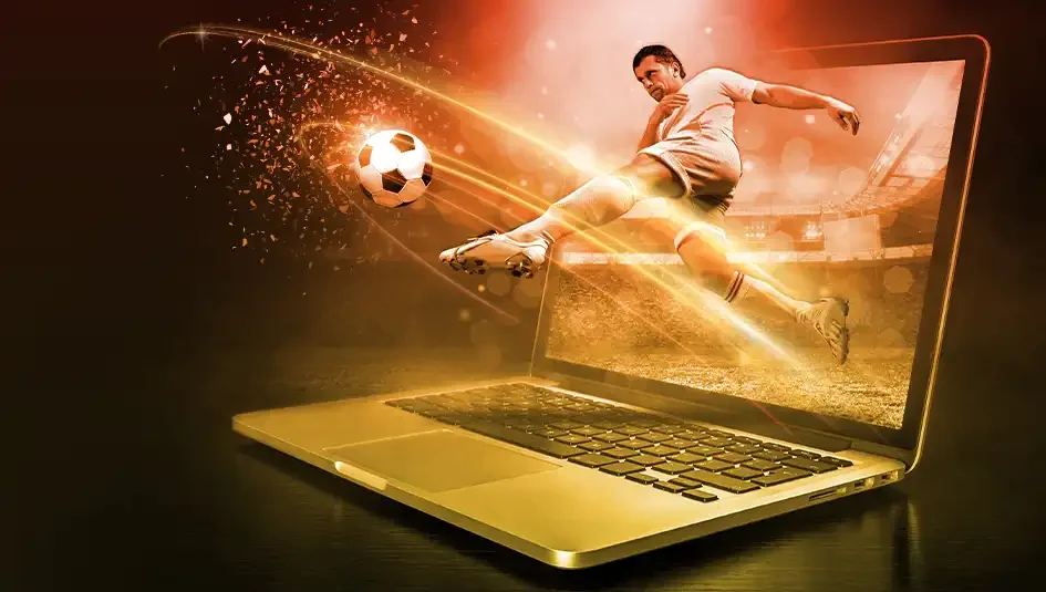 Joueur de football en action sur ordinateur portable